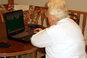 Grandma on a computer by Flickr/mhofstrand